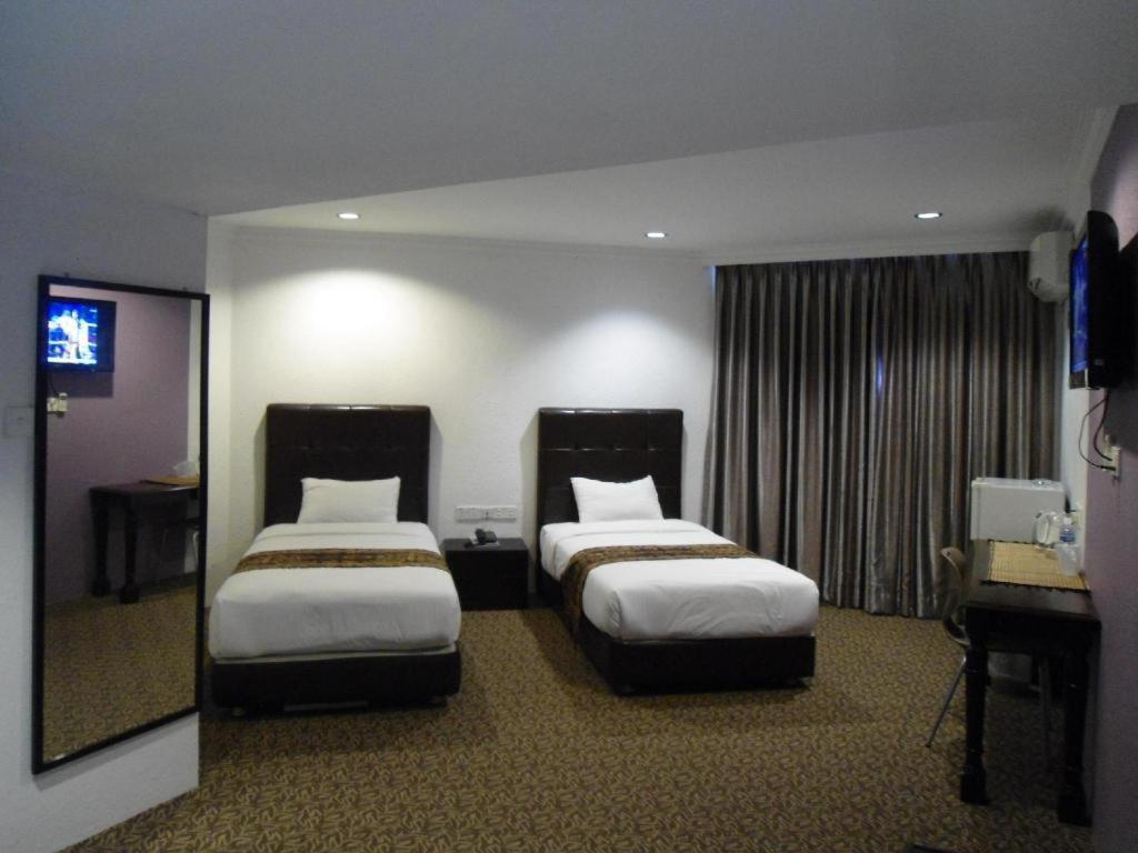 Regent Hotel Бінтулу Екстер'єр фото