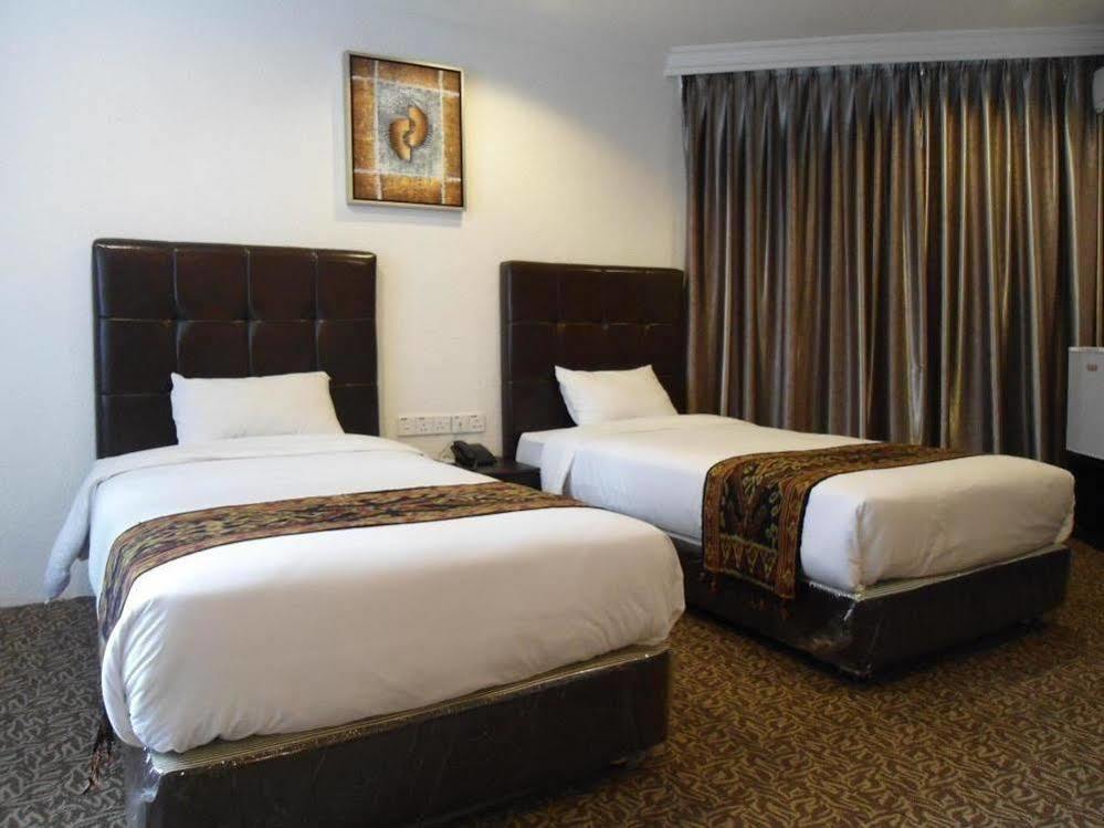 Regent Hotel Бінтулу Екстер'єр фото